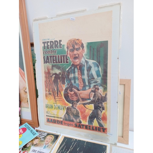 523 - A collection of movie and theatre memorabilia to include framed Fort Apache poster, Piccadilly Hayri... 