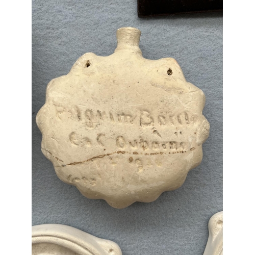 155 - Thirteen Ivorex chalkware plaques and ornaments to include Pilgrim Bottle, Mont Orgueil Castle Gorey... 