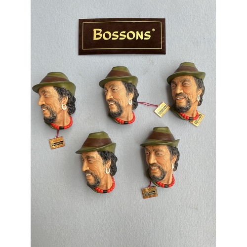 61 - Five boxed Bossons Tibetan hand painted chalkware head wall plaques