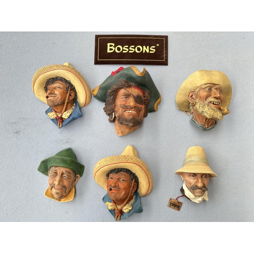 67 - Six boxed Bossons hand painted chalkware head wall plaques comprising Sardinian, two Pancho, Rumania... 