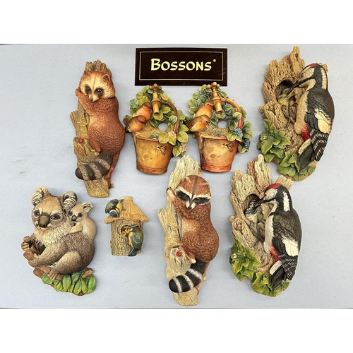 93 - Eight Bossons hand painted chalkware animal wall plaques to include racoon, robins, blue tits etc.