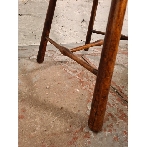 422 - Three pieces of furniture, one early 20th century John Taylor & Son mahogany two tier side table, on... 