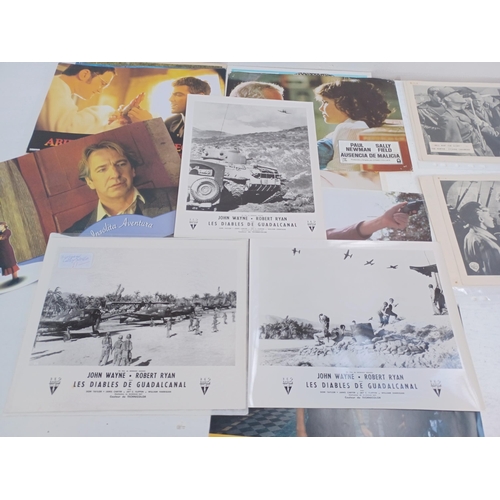 531 - A collection of lobby cards to include Bonnie et Clyde, Hell Bent For Glory, Walt Disney Les Adventu... 