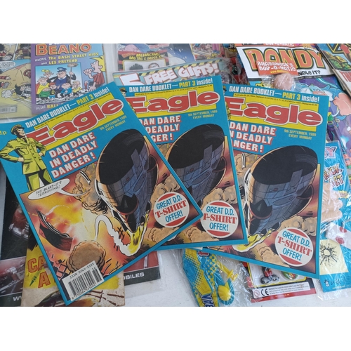 534 - A collection of comics, many with free gifts and some multiple copies to include Dan Dare Holiday Sp... 