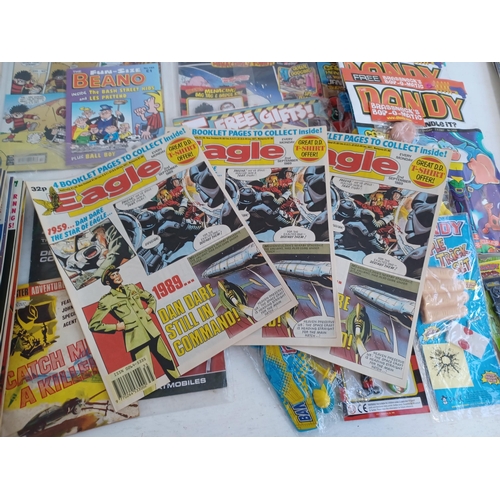 534 - A collection of comics, many with free gifts and some multiple copies to include Dan Dare Holiday Sp... 