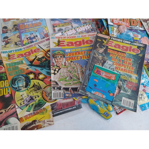 534 - A collection of comics, many with free gifts and some multiple copies to include Dan Dare Holiday Sp... 