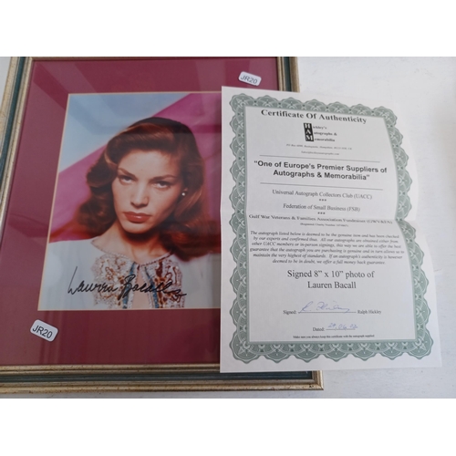 536 - A collection of seven framed signed photographs, some with certificates of authenticity to include L... 