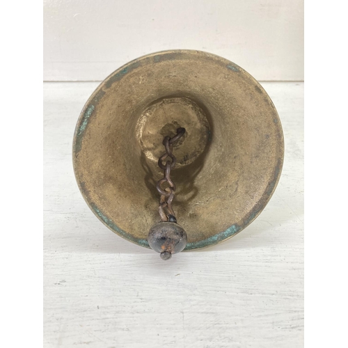 201 - Two vintage brass bells with wooden handles - largest approx. 27cm high