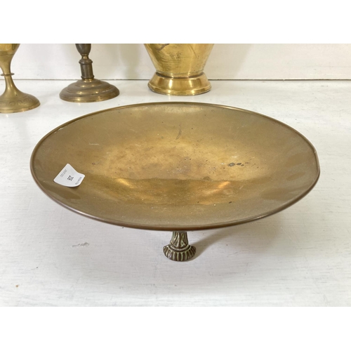 206 - A collection of assorted metalware to include Ianthe silver plated footed potpourri bowl, pair of br... 