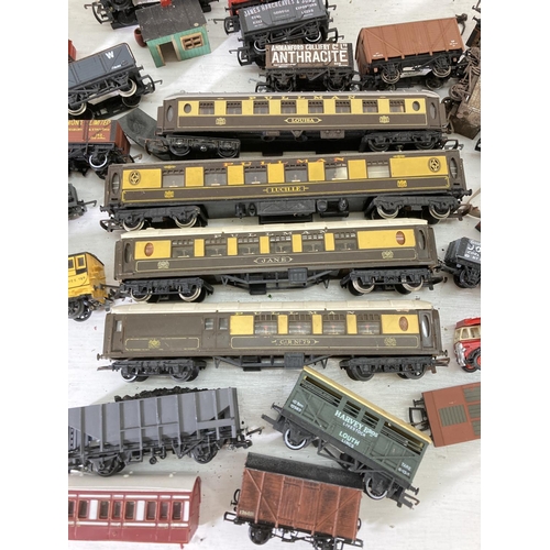 207 - A collection of assorted OO gauge model railway accessories to include boxed Hornby 51232 pug loco i... 