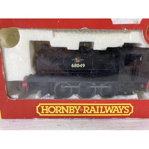 214 - A boxed Hornby OO gauge R2094A Class J94 68049 locomotive in black BR livery