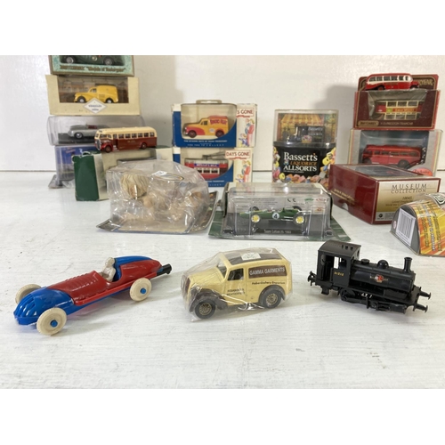 221 - A collection of assorted diecast model vehicles and action figures to include Toy Biz The Lord of th... 