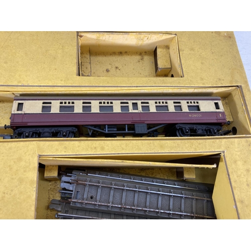 246 - A boxed vintage Tri-ang RAX electric scale model train set