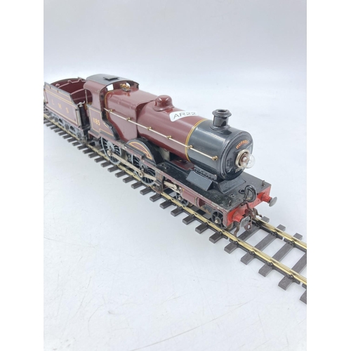 253E - A mid 20th century Hornby E220 20-volt Special locomotive and tender with automatic reversing and el... 