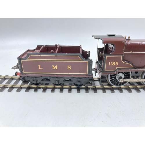 253E - A mid 20th century Hornby E220 20-volt Special locomotive and tender with automatic reversing and el... 