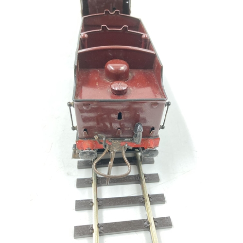 253E - A mid 20th century Hornby E220 20-volt Special locomotive and tender with automatic reversing and el... 