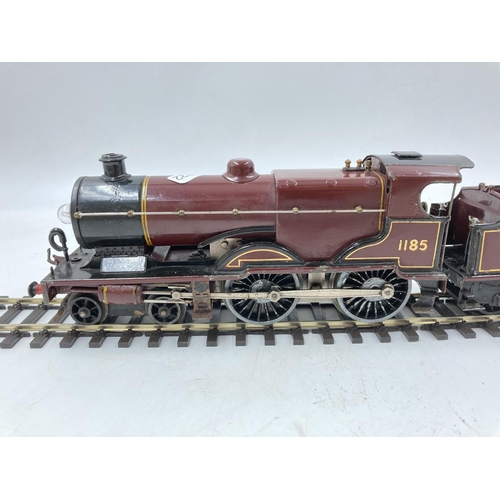 253E - A mid 20th century Hornby E220 20-volt Special locomotive and tender with automatic reversing and el... 