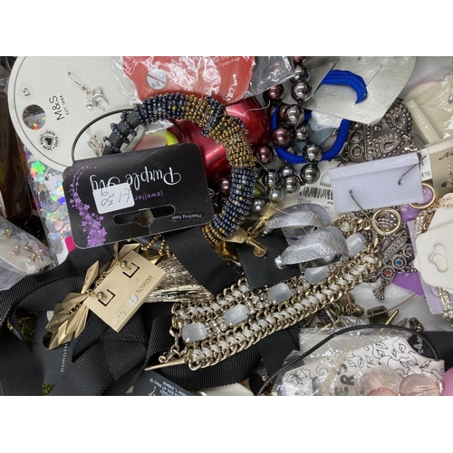 259 - A box containing a large quantity of assorted costume jewellery to include necklaces, earrings, Doro... 