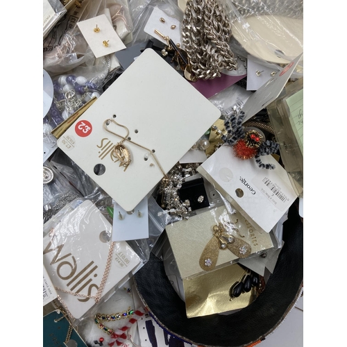 280 - A large quantity of assorted costume jewellery to include bangles, necklaces, bracelets etc.