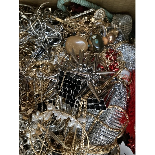 286 - A box containing a large quantity of assorted costume jewellery