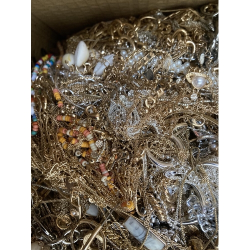 286 - A box containing a large quantity of assorted costume jewellery