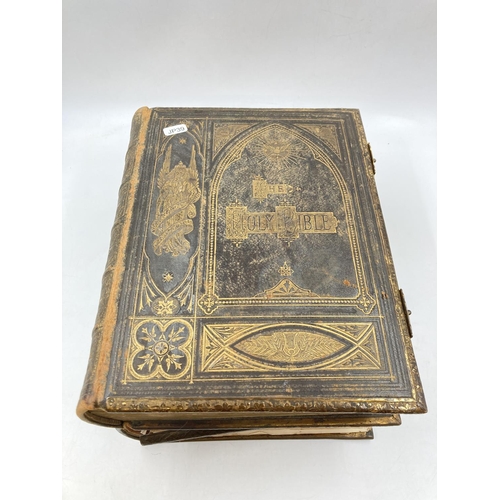 296 - Two 19th century leather bound Brown's Self-Interpretating Family Bibles of the Old and New Testamen... 