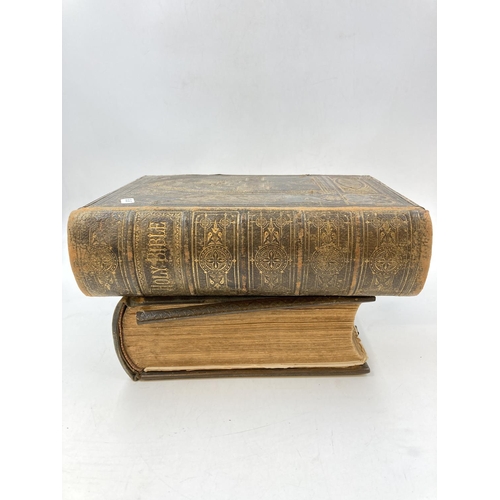 296 - Two 19th century leather bound Brown's Self-Interpretating Family Bibles of the Old and New Testamen... 