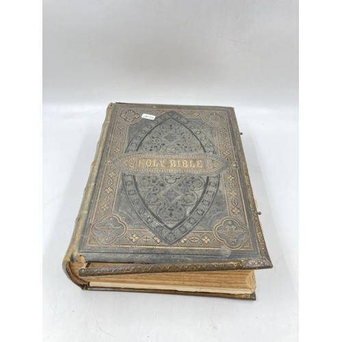 296 - Two 19th century leather bound Brown's Self-Interpretating Family Bibles of the Old and New Testamen... 