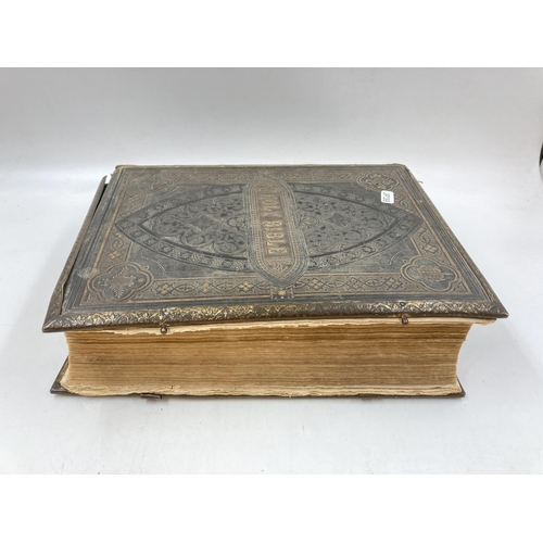 296 - Two 19th century leather bound Brown's Self-Interpretating Family Bibles of the Old and New Testamen... 