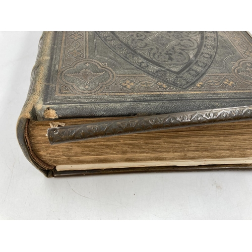 296 - Two 19th century leather bound Brown's Self-Interpretating Family Bibles of the Old and New Testamen... 