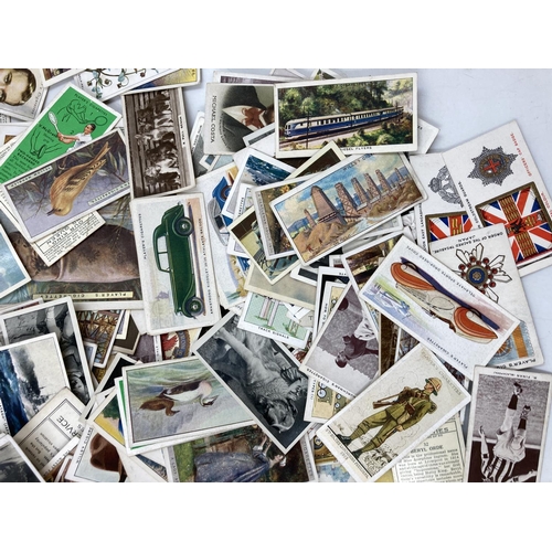 300 - A large collection of assorted cigarette cards to include Senior Service, W. D. & H. O. Will's, John... 