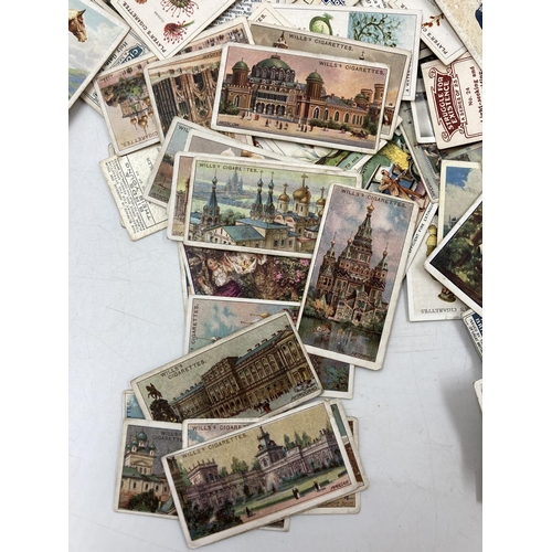 300 - A large collection of assorted cigarette cards to include Senior Service, W. D. & H. O. Will's, John... 