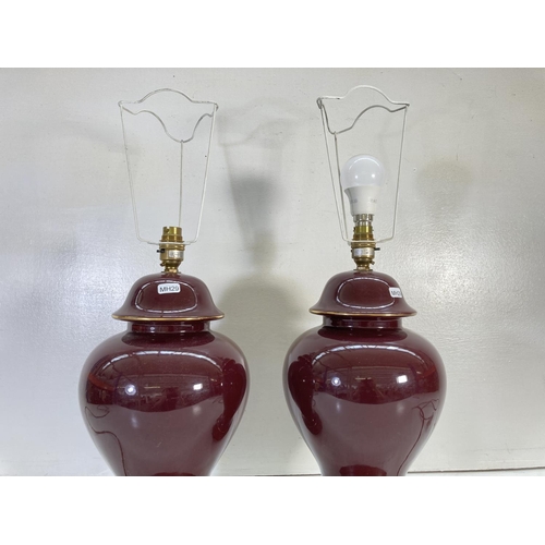 309E - A pair of E. & E. M. Hughes purple ceramic table lamps - approx. 43cm high