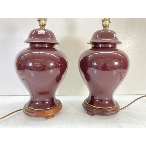 309E - A pair of E. & E. M. Hughes purple ceramic table lamps - approx. 43cm high