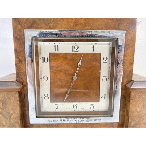 310 - An Art Deco H. Pidduck & Sons Ltd of Hanley burr walnut cased presentation clock - Presented to the ... 