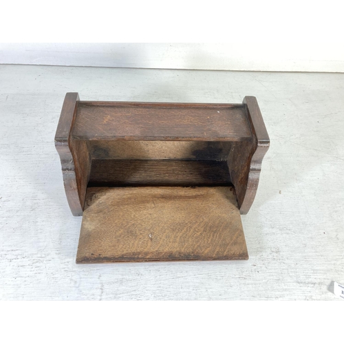 332 - An early/mid 20th century oak wall hanging candle box - approx. 20cm high x 29.5cm wide and 15cm dee... 