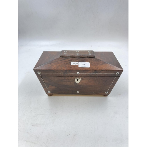 335 - A Regency rosewood and mother of pearl inlaid sarcophagus tea caddy - approx. 19cm high x 30cm wide ... 