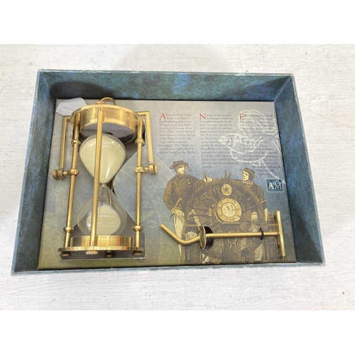 338 - A boxed Authentic Models maritime hourglass