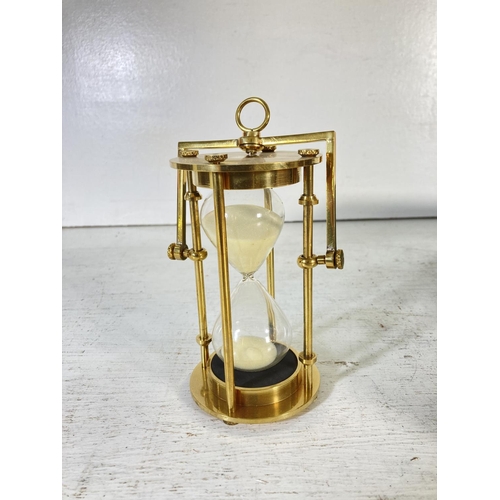 338 - A boxed Authentic Models maritime hourglass