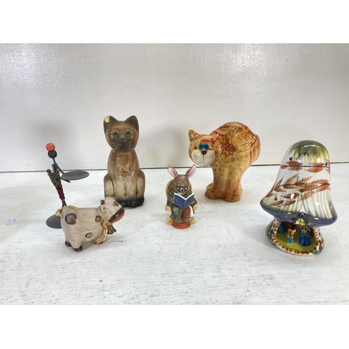 342 - A collection of treen and ceramic ornaments to include ceramic cat money box, treen bowls, hardwood ... 