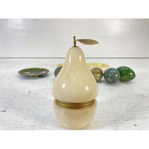 345 - Ten items, five semi precious stone carved egg ornaments, one white onyx hinged pot in the form of a... 