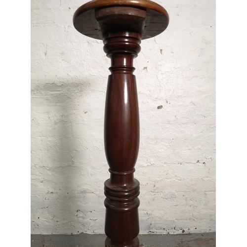 359 - An early/mid 20th century mahogany torchère - approx. 103cm high x 24cm in diameter