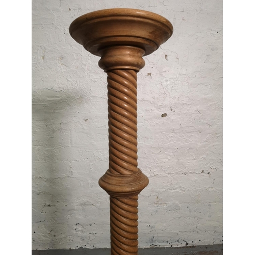 360 - A mid/late 20th century beech barley twist torchère - approx. 100cm high x 23cm in diameter