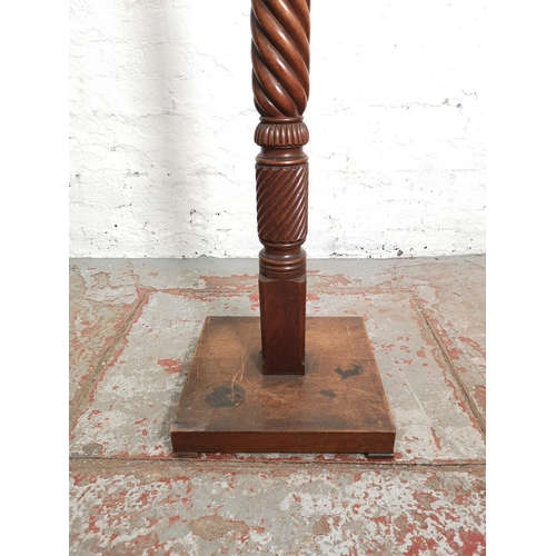 361 - An early/mid 20th century mahogany barley twist torchère - approx. 107cm high x 30cm in diameter