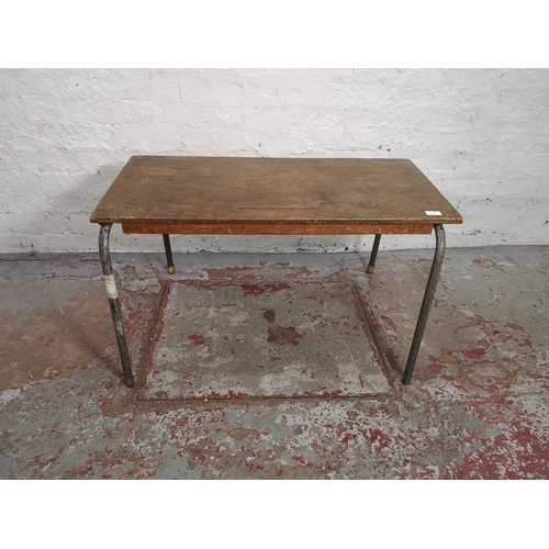 363 - Eleven mid 20th century beech and plywood stacking tables with metal supports