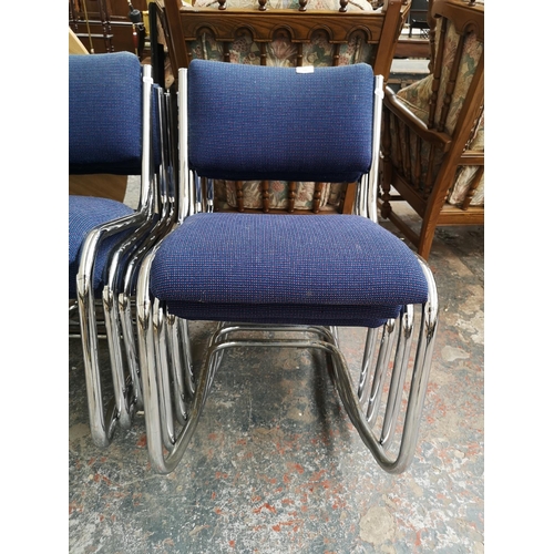 364 - Sixteen blue upholstered and chrome plated stacking chairs