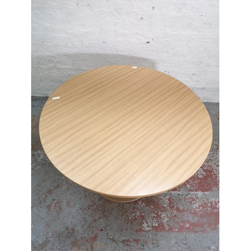 369 - A Swedish Kontorsmöbler oak effect circular office table with metal pedestal support - approx. 120cm... 