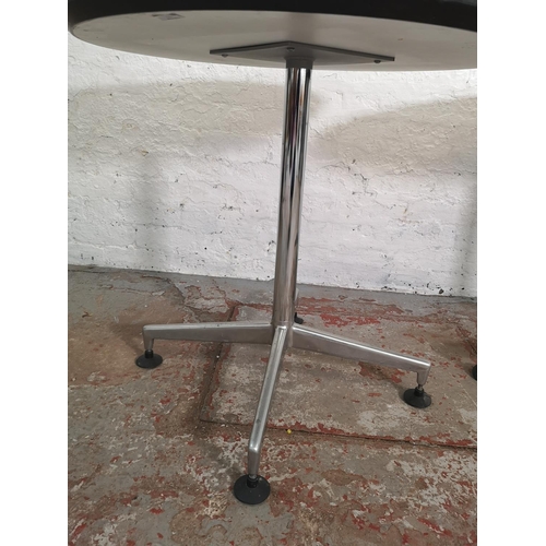 372 - Two modern grey laminate circular bistro tables with metal pedestal supports - approx. 74cm high x 8... 