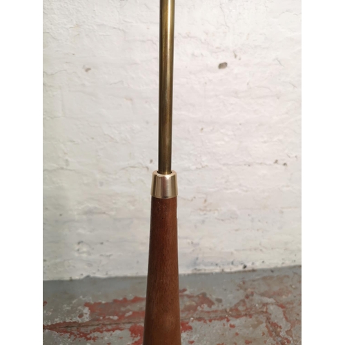 380 - A mid 20th century teak and brass floor lamp - approx. 145cm high