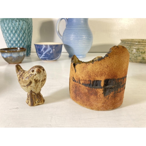 39 - A collection of 20th century ceramics to include Royal Cauldon blue glazed jug, studio pottery etc.